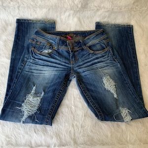 Distressed boot cut jeans